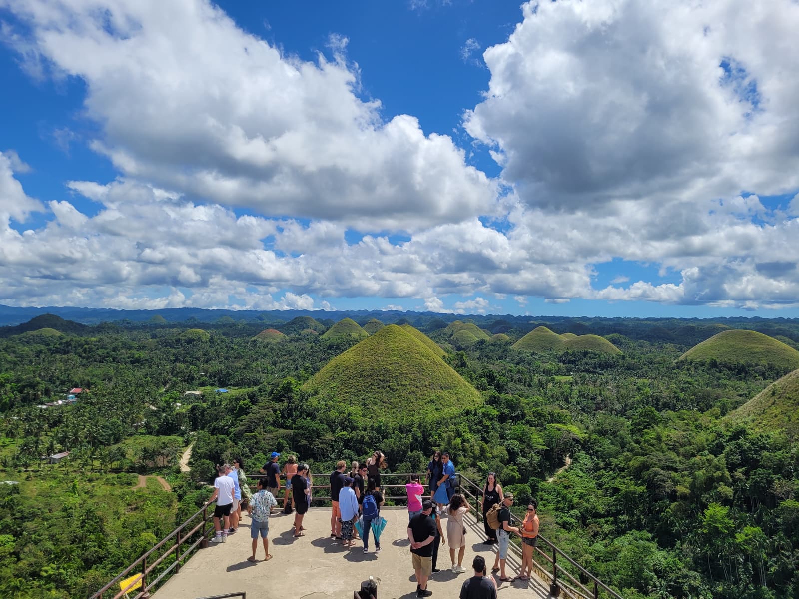 Aerial view of the cone-shaped Chocolate Hills and the viewing deck at Chocolate Hills Complex, Carmen Bohol